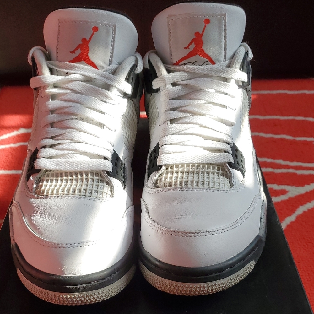 White and Black Sneakers with Red Logo